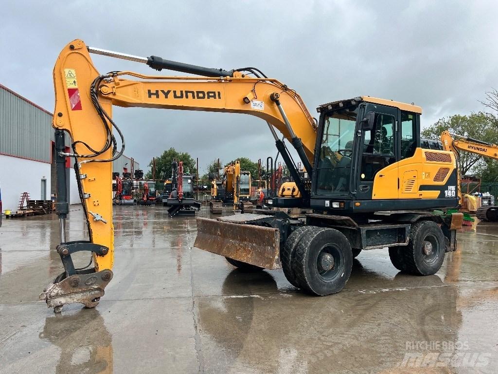 Hyundai HW140 حفارات بعجل