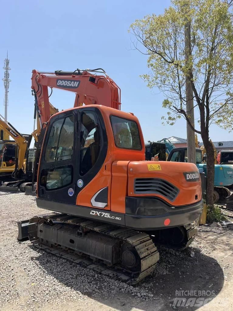 Doosan DX75 حفارات صغيرة أقل من 7 طن (حفارات صغيرة)