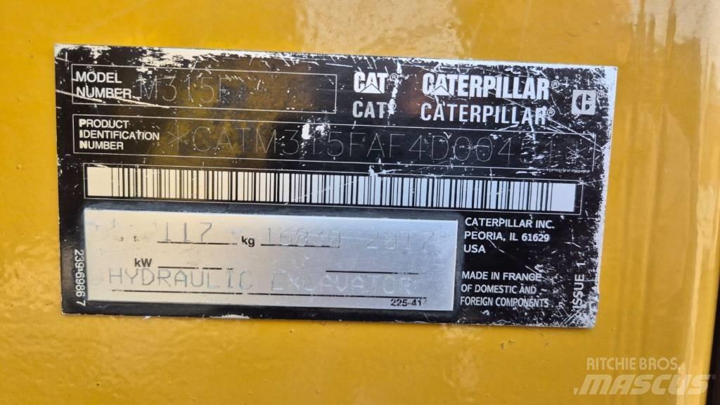 CAT M 315 F حفارات بعجل