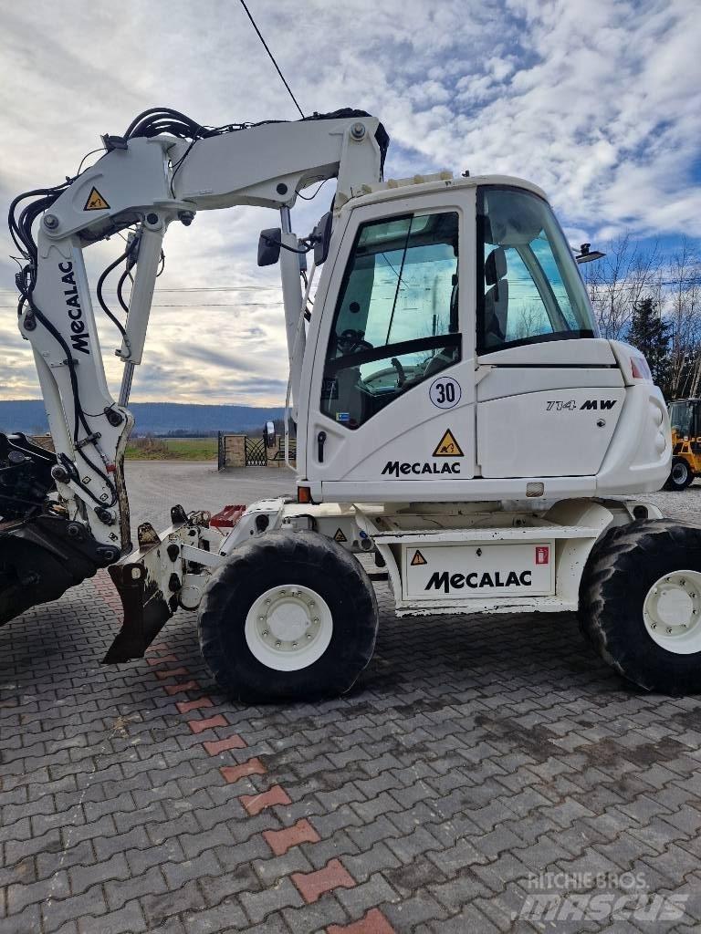 Mecalac 714 MW حفارات بعجل