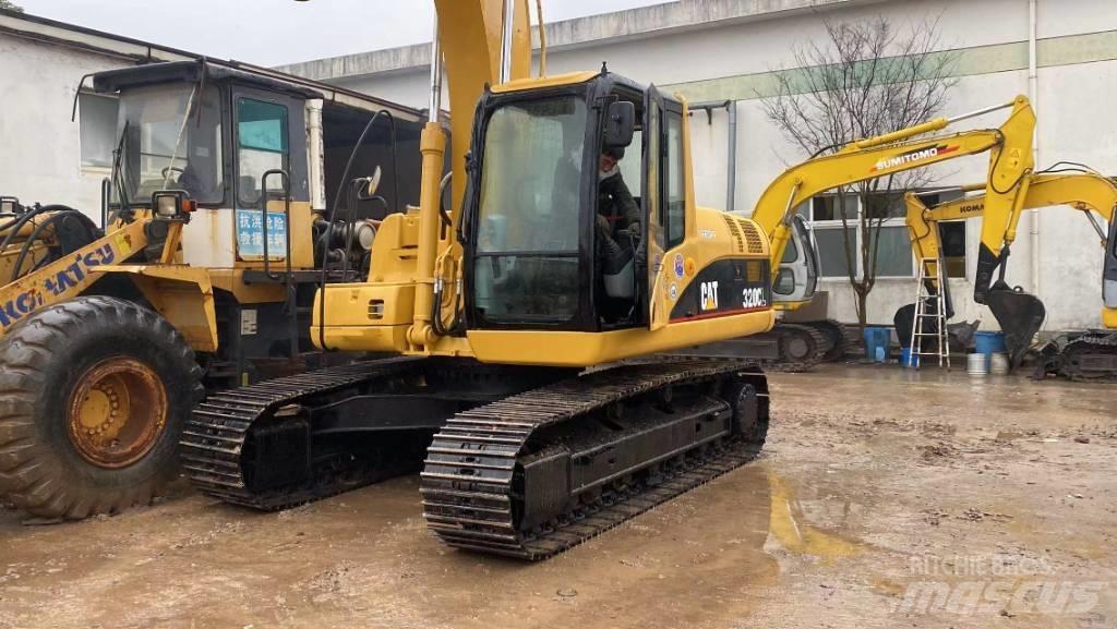 CAT 320 C L حفارات زحافة
