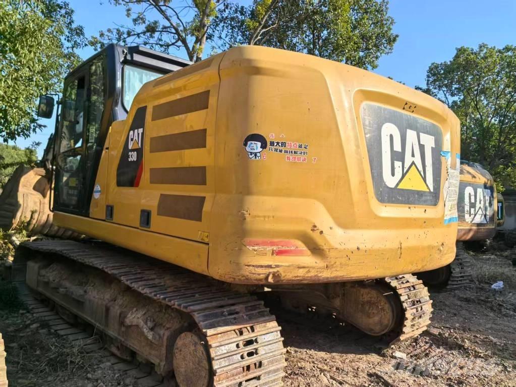 CAT 323 حفارات زحافة