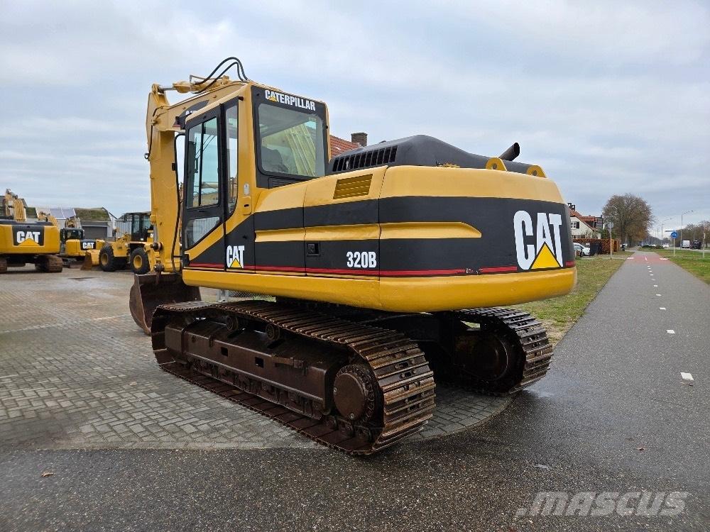 CAT 320BL حفارات زحافة