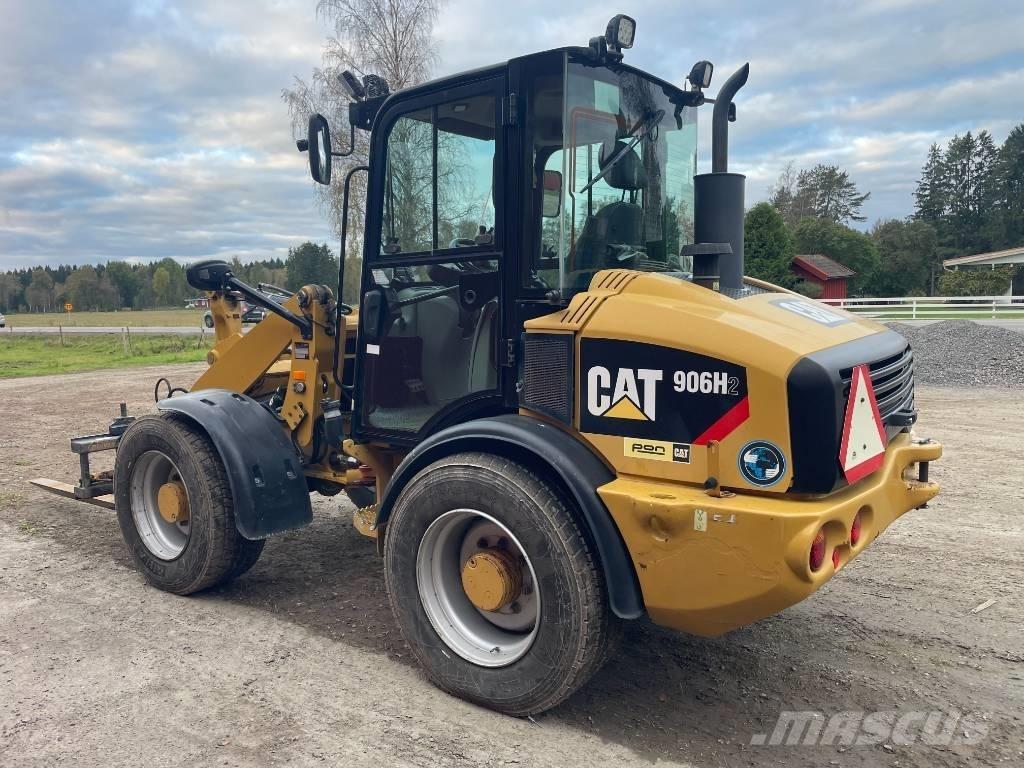 CAT 906 H 2 لوادر بعجل