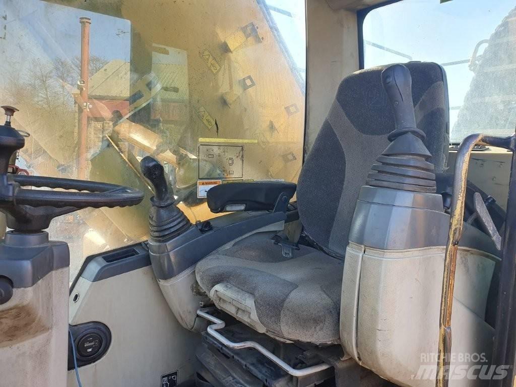 CAT M 325 C MH مناولات المخلفات / مناولات صناعية