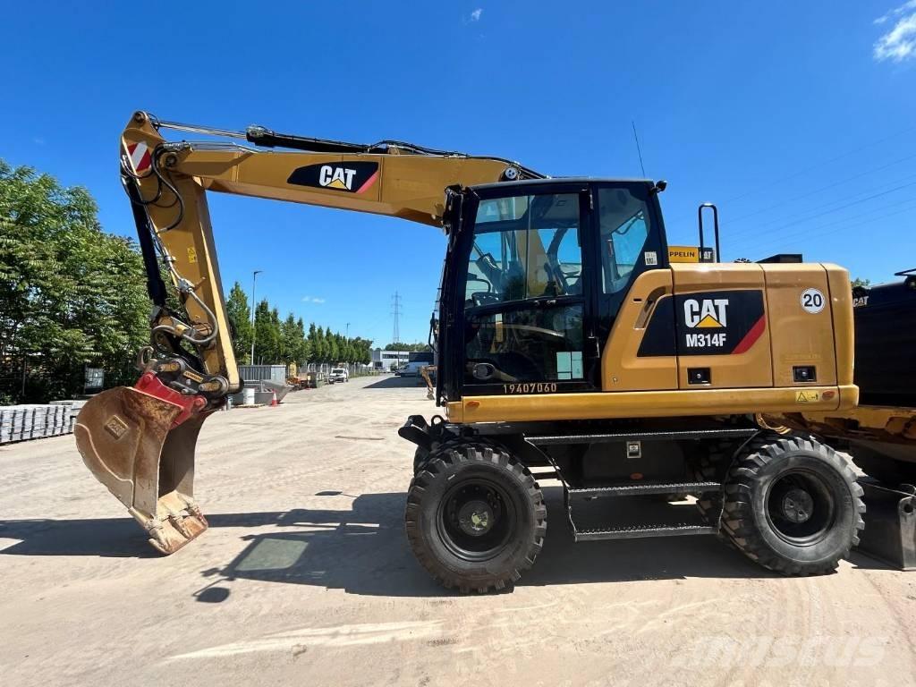 CAT M 314 F حفارات بعجل
