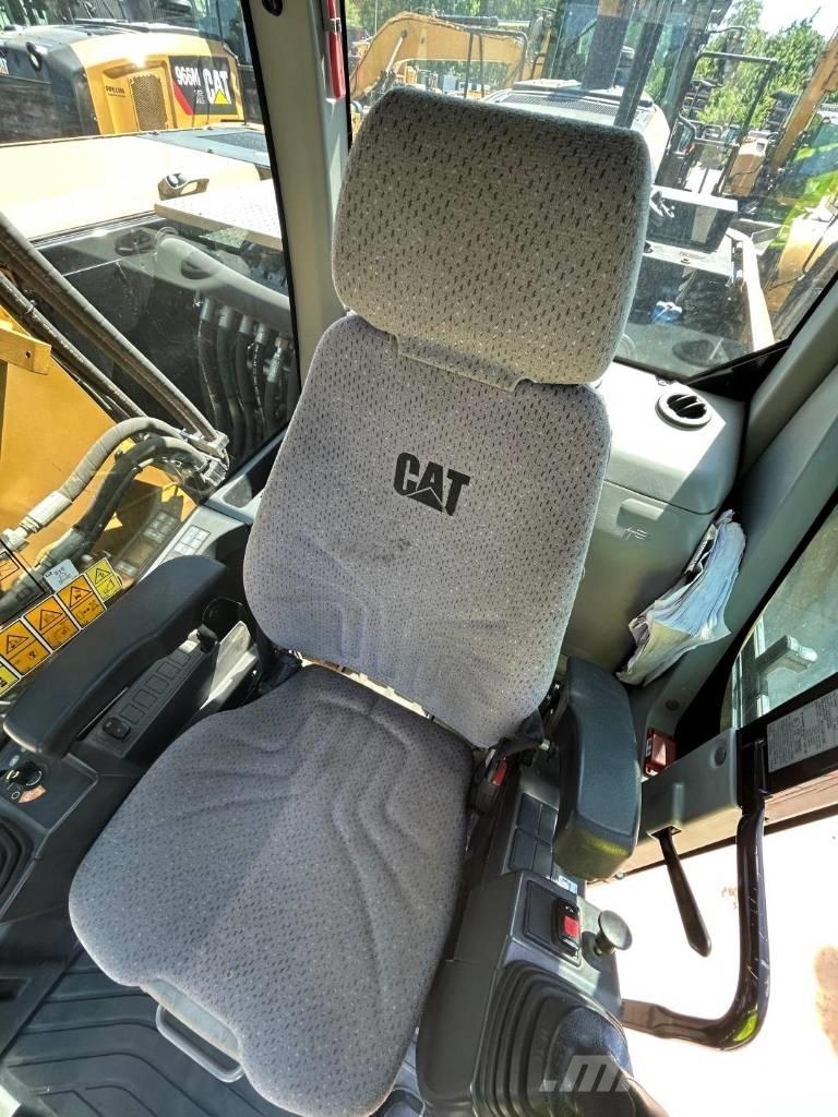 CAT M 314 F حفارات بعجل