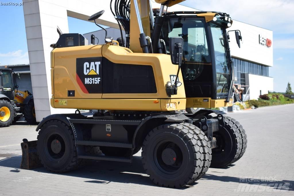 CAT M 315 F حفارات بعجل