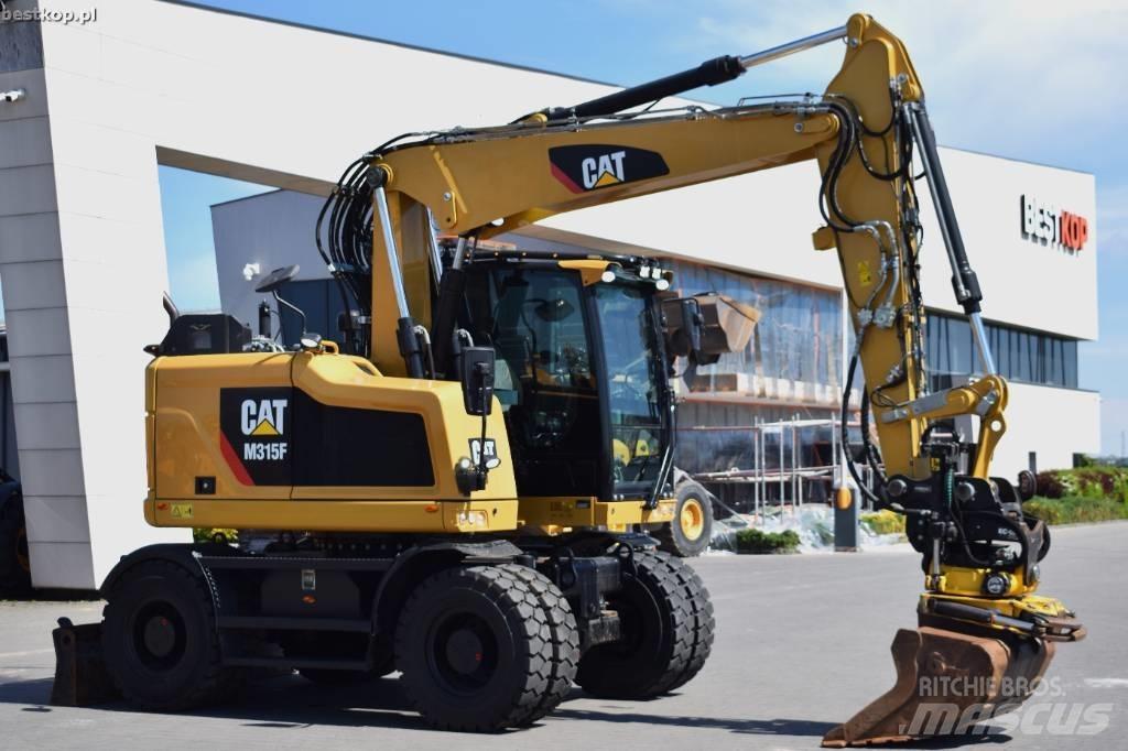 CAT M 315 F حفارات بعجل