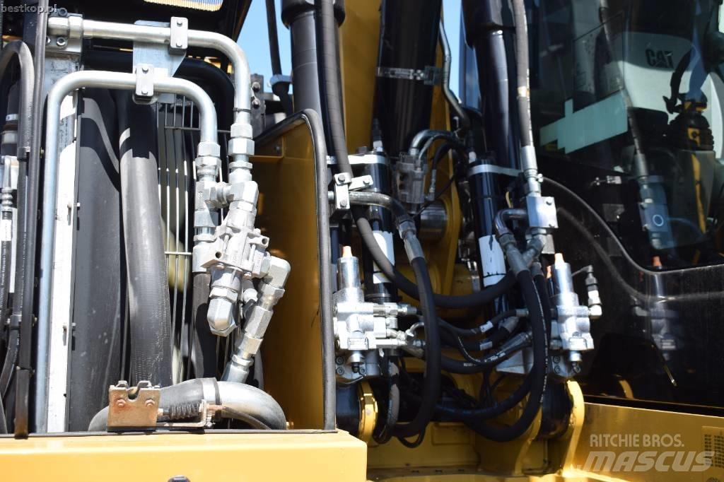 CAT M 315 F حفارات بعجل
