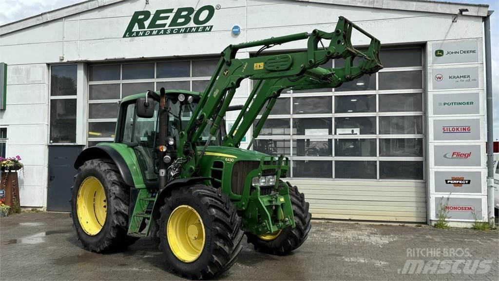 John Deere 6430 الجرارات