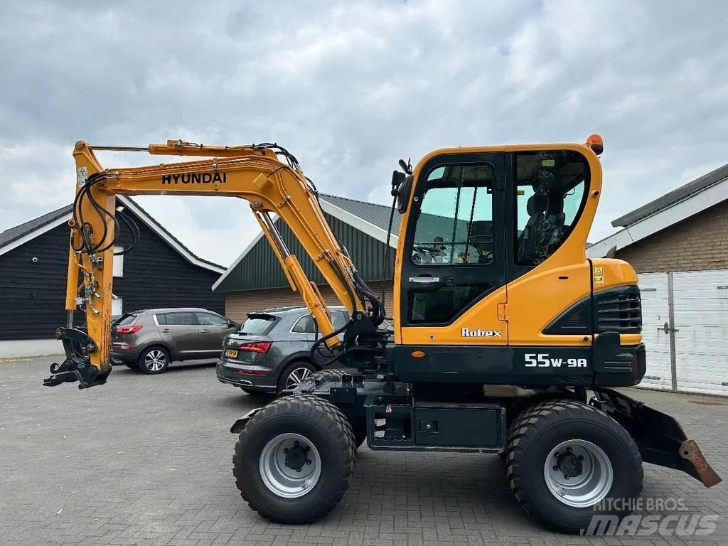 Hyundai 55W-9A حفارات بعجل