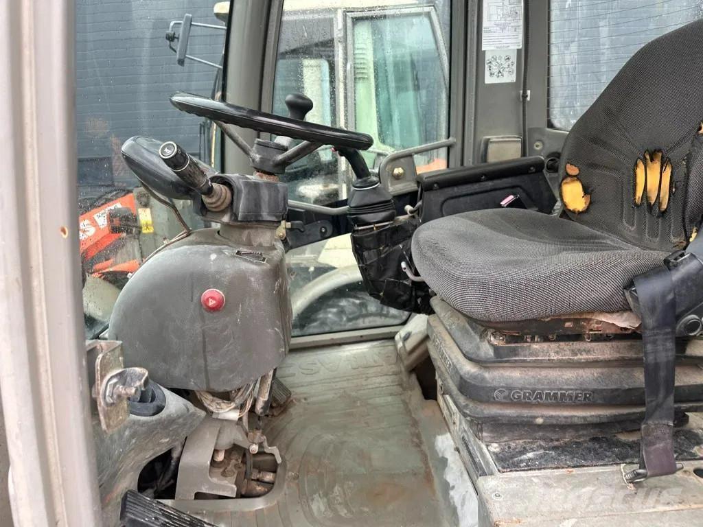 Atlas 65 x4x لوادر بعجل