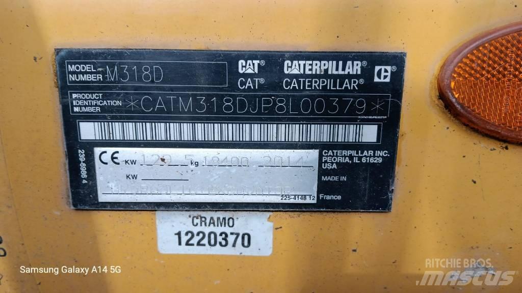 CAT M 318 D حفارات بعجل