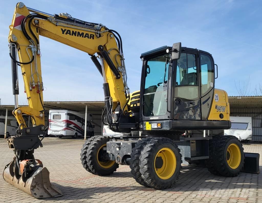Yanmar B 95 W حفارات بعجل