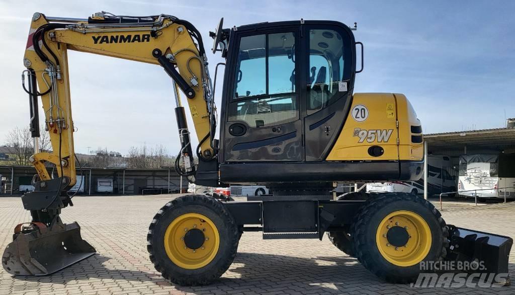 Yanmar B 95 W حفارات بعجل