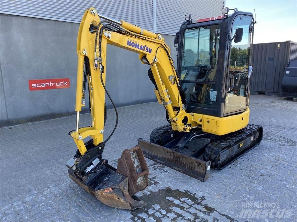 Komatsu PC24MR-5 حفارات بعجل