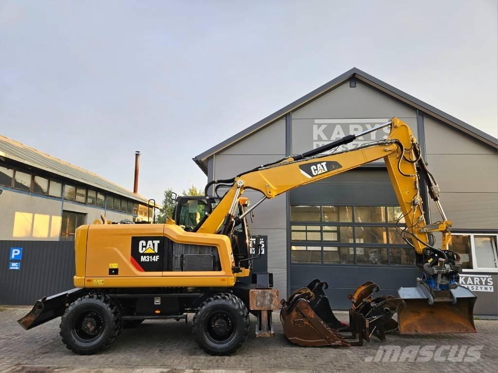 CAT M 314 حفارات بعجل