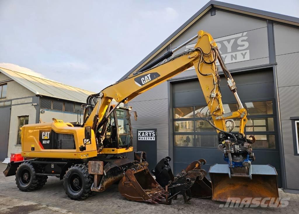 CAT M 314 حفارات بعجل