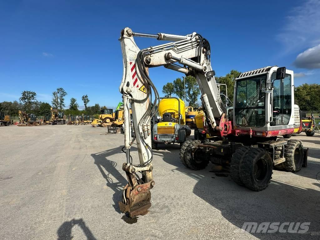 Takeuchi TB 175 W حفارات بعجل
