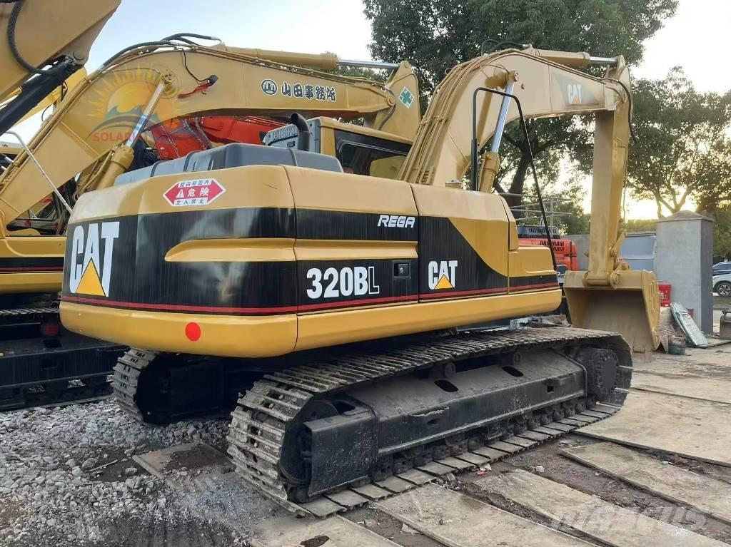 CAT 320 B L حفارات زحافة