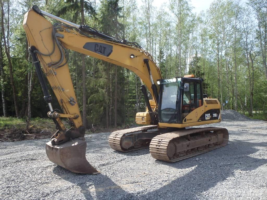 CAT 319 D L حفارات زحافة