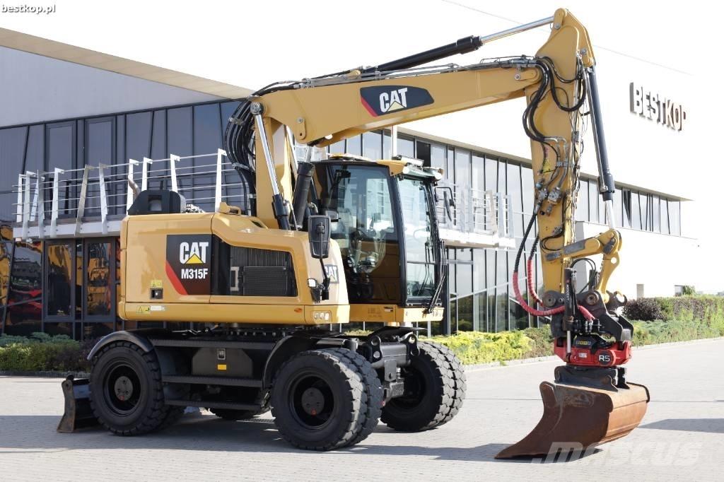 CAT M 315 F حفارات بعجل