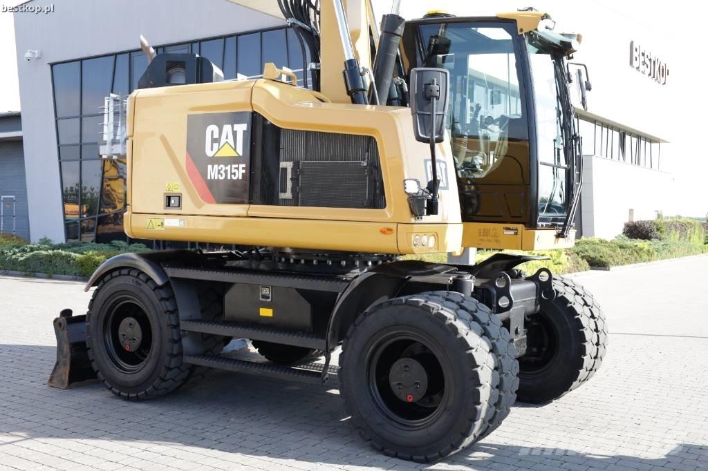 CAT M 315 F حفارات بعجل