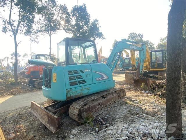 Kobelco sk60 حفارات زحافة