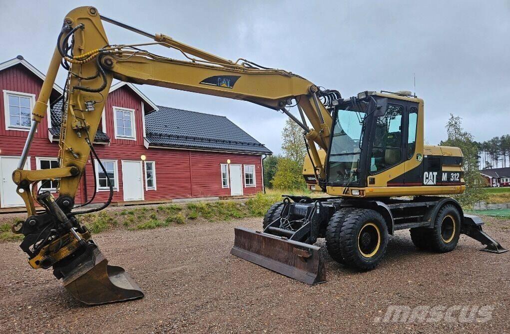CAT M312 لوادر بعجل