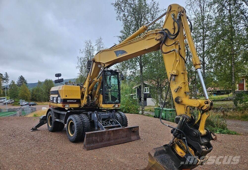 CAT M312 لوادر بعجل