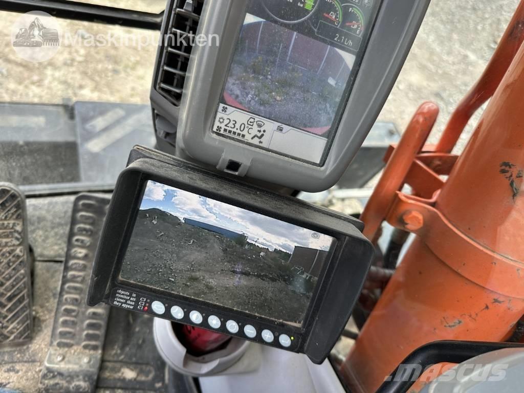 Hitachi ZX 140 W-5B حفارات بعجل