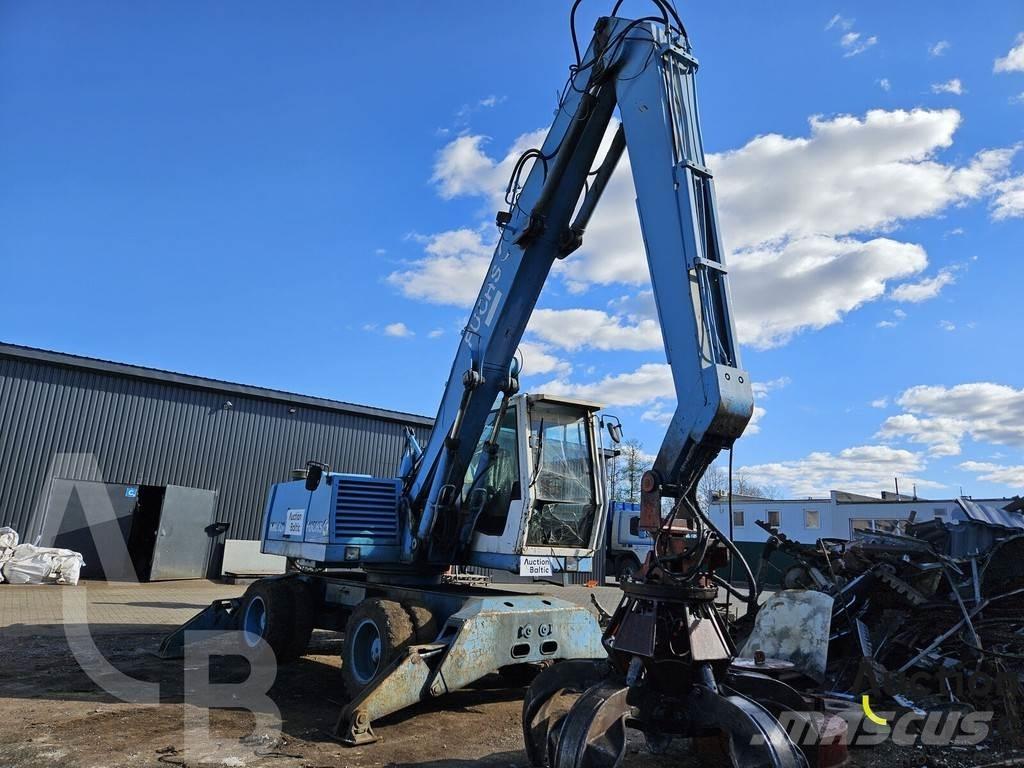 Fuchs MHL 320 حفارات بعجل
