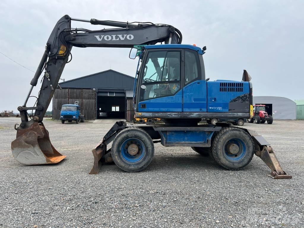Volvo EW 140 C حفارات بعجل