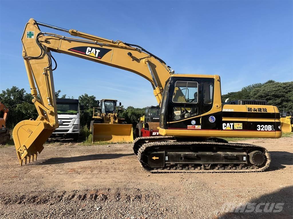 CAT 320 B L حفارات زحافة