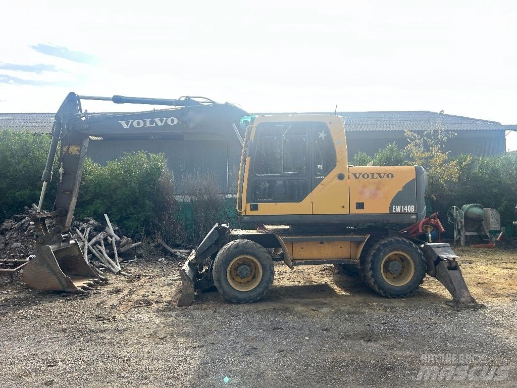 Volvo EW 140 B حفارات بعجل