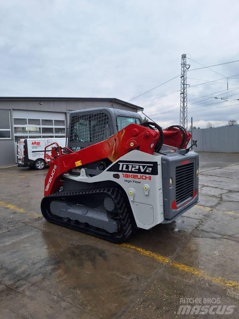 Takeuchi TL12V-2 لوادر انزلاقية التوجيه