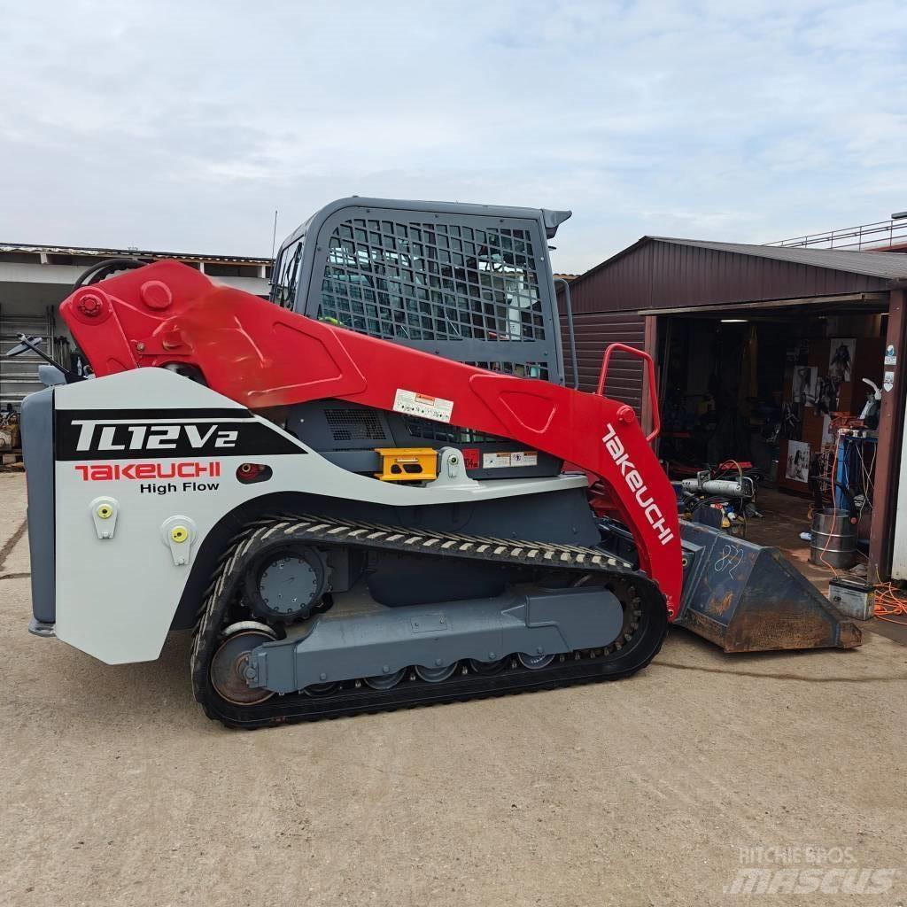Takeuchi TL12V-2 لوادر انزلاقية التوجيه