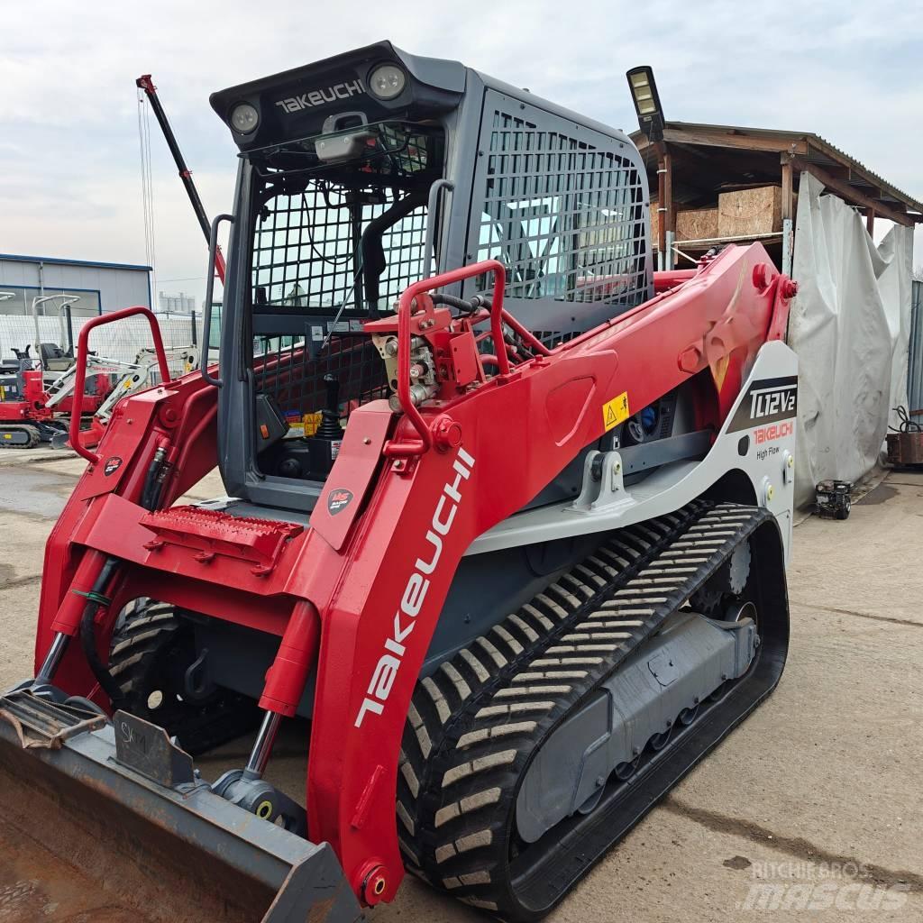 Takeuchi TL12V-2 لوادر انزلاقية التوجيه