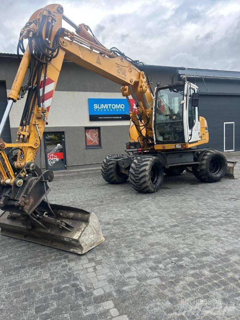 Liebherr 314 حفارات بعجل