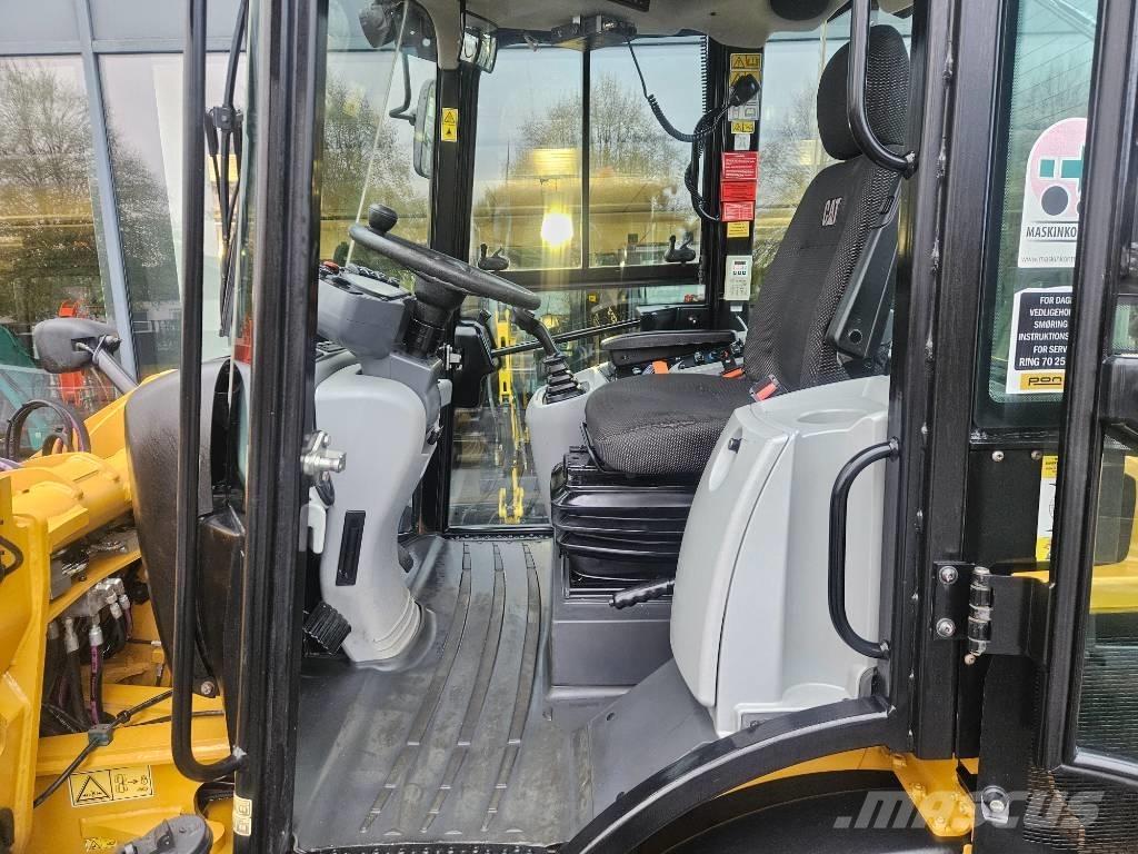 CAT 908m لوادر بعجل