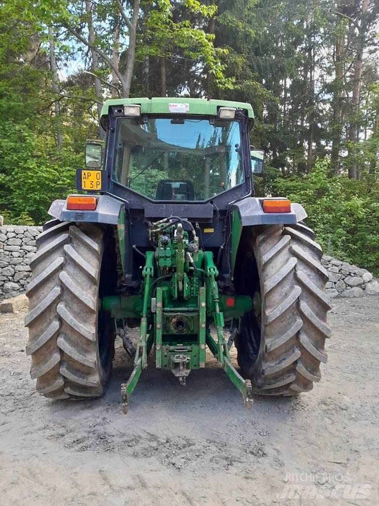 John Deere 6410 الجرارات