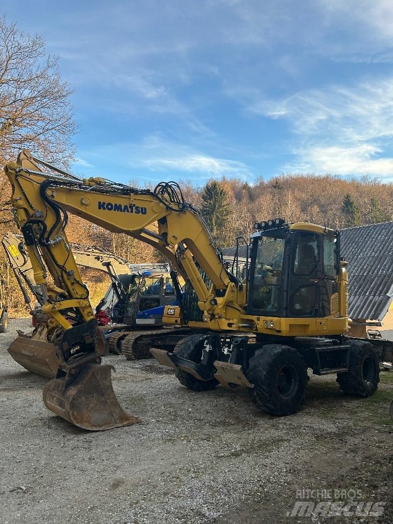 Komatsu Pw118mr11 حفارات بعجل