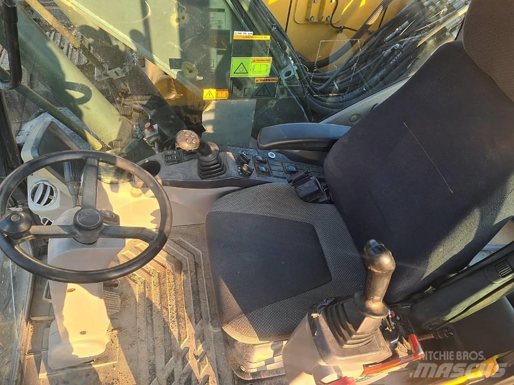 Volvo EW 140 C حفارات بعجل