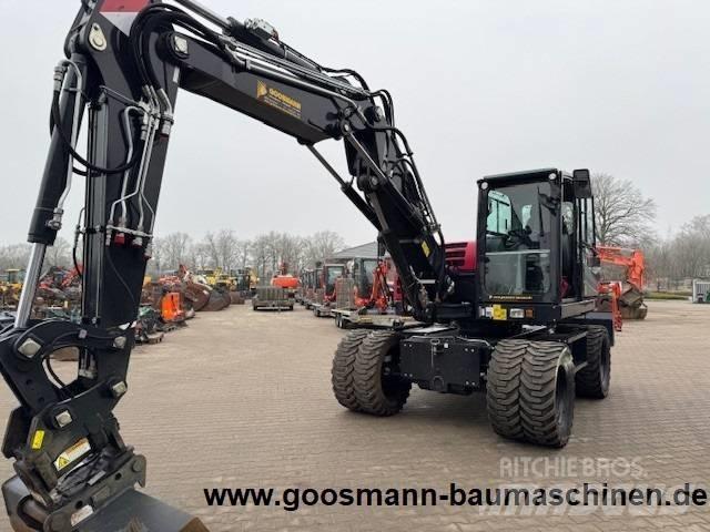 Yanmar B 110 W حفارات بعجل