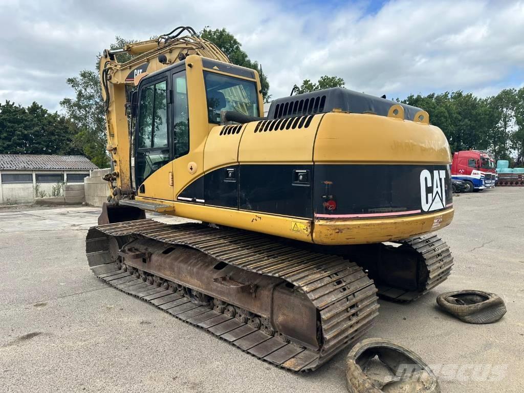 CAT 318 C L حفارات زحافة