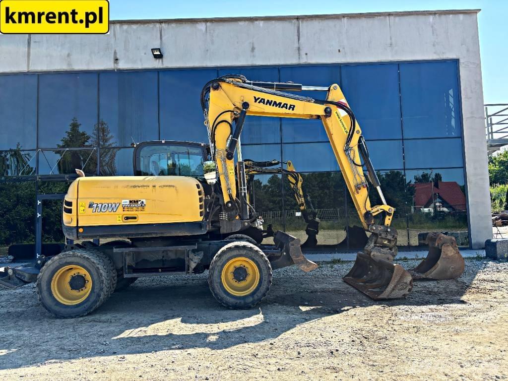 Yanmar B 110 W حفارات بعجل