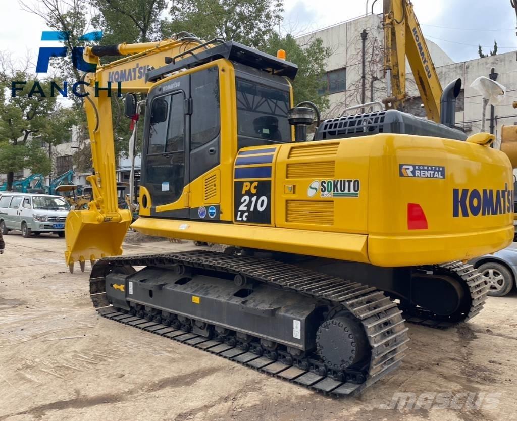  koamtsu pc210 حفارات زحافة
