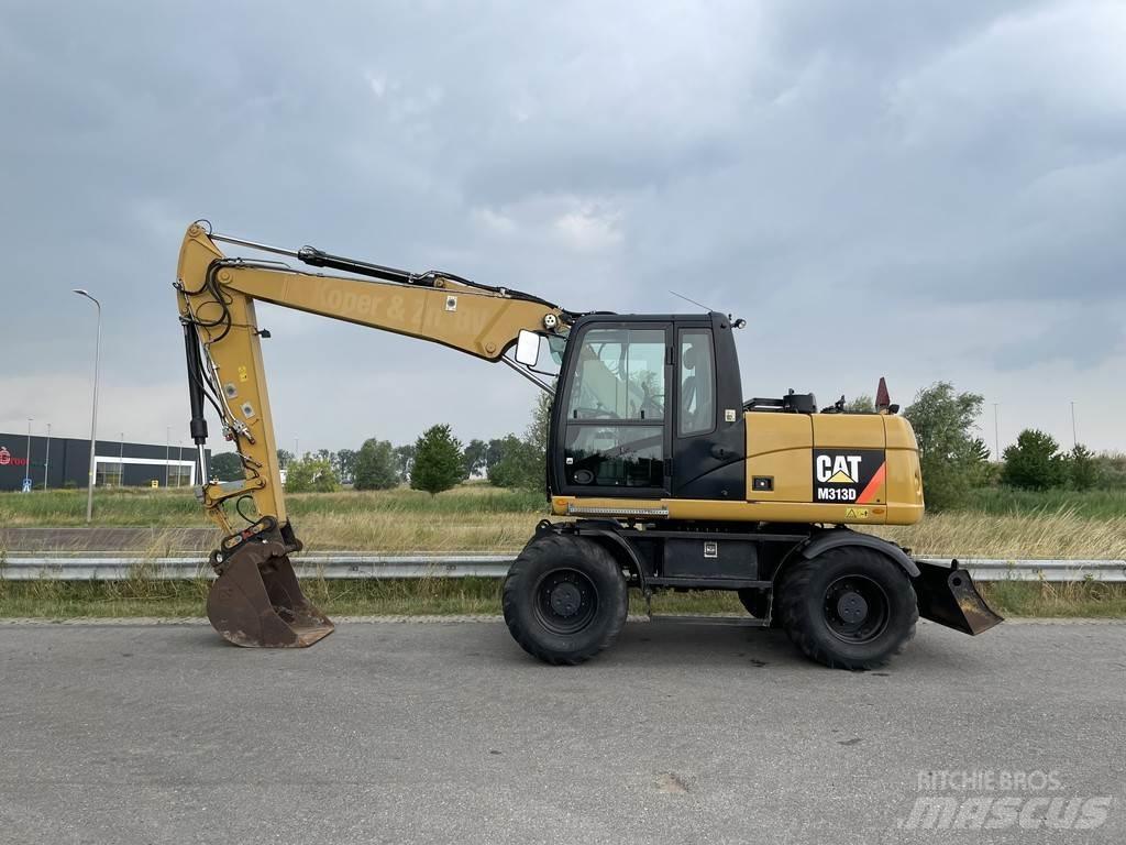 CAT M313D - CE حفارات بعجل