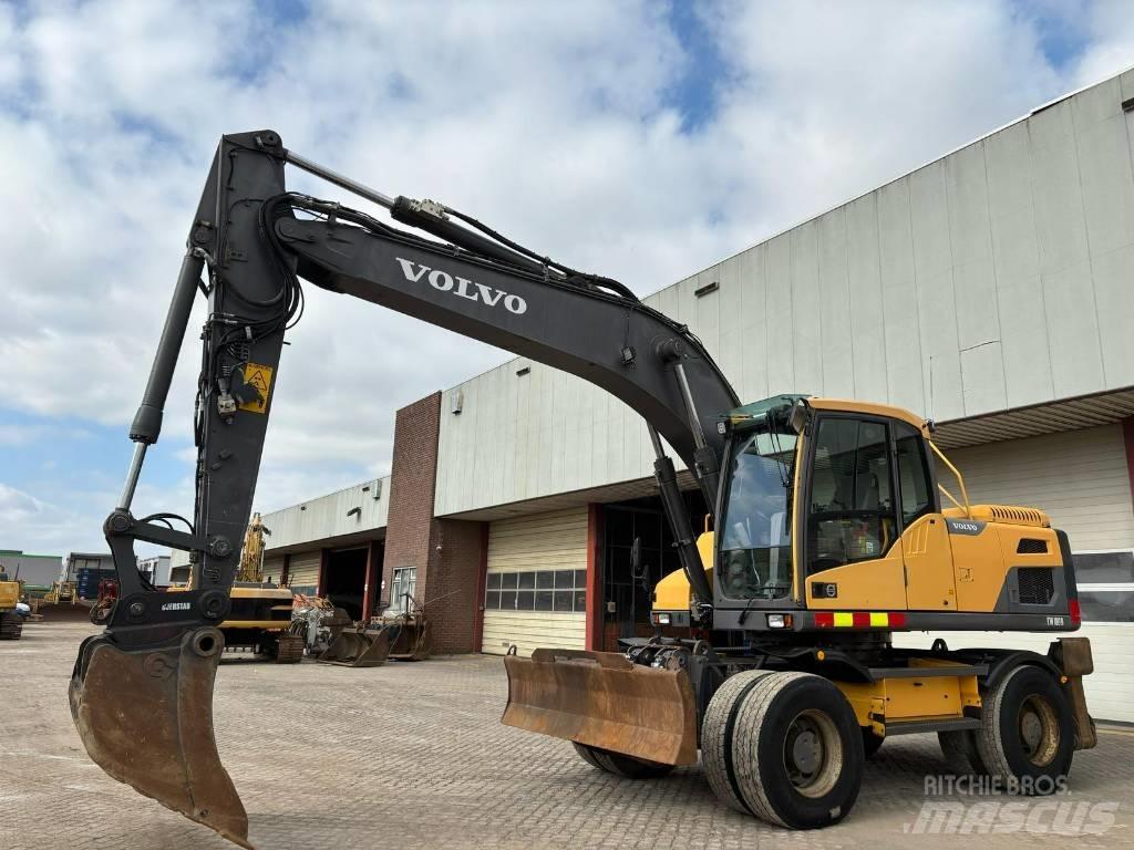 Volvo EW 180 D حفارات بعجل